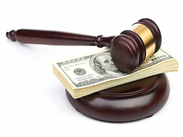 Gavel and money representing alimony 